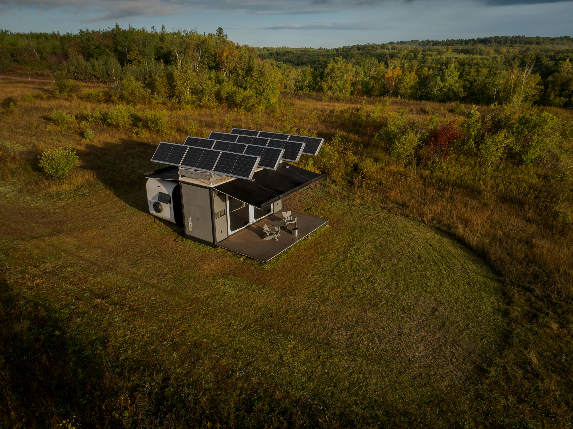 Electric Outdoors Canopy set in a wooded campsite